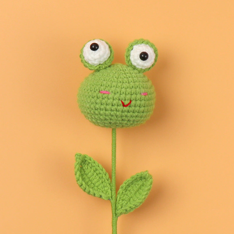 Handmade crocheted big-eyed frog doll