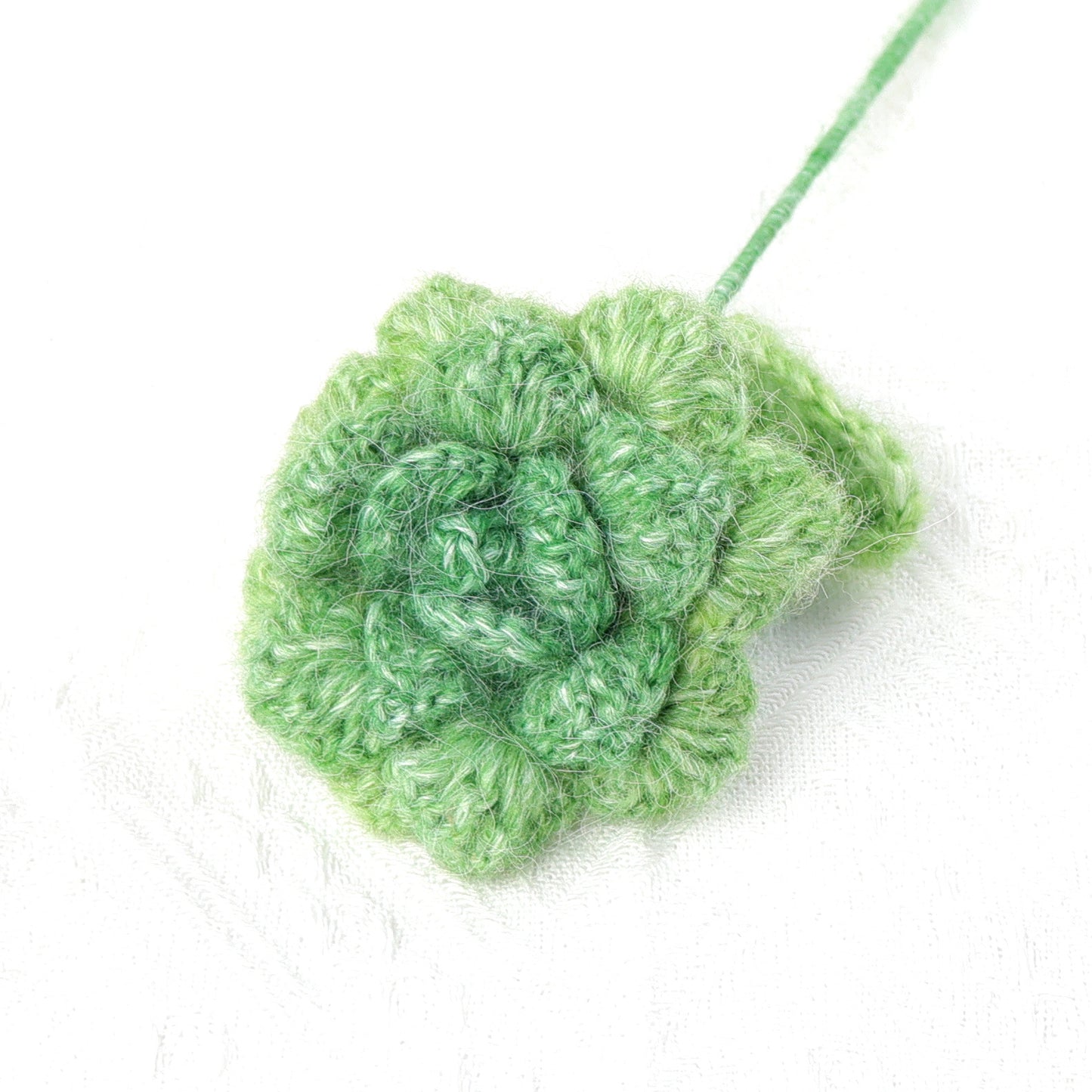 Crocheted seahorse hair rose