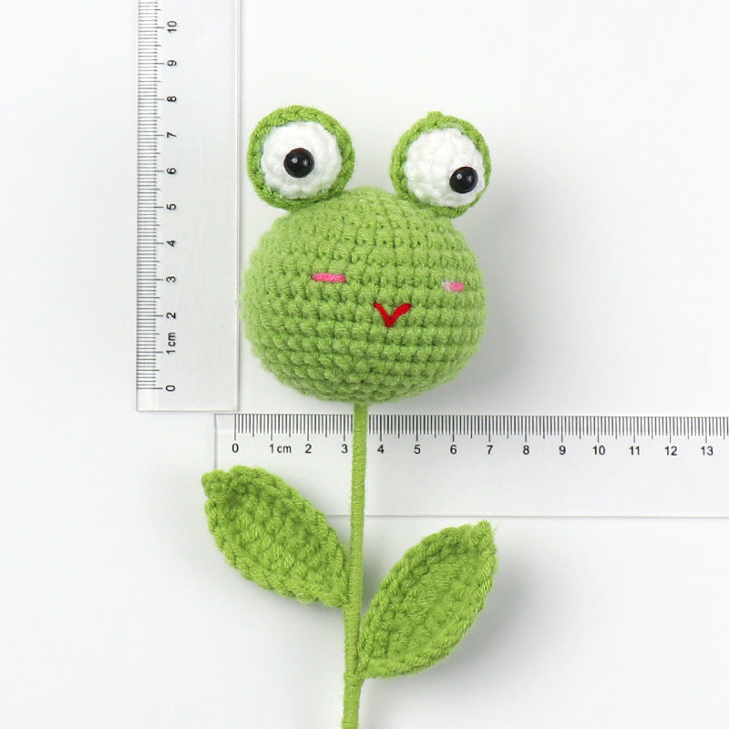 Handmade crocheted big-eyed frog doll