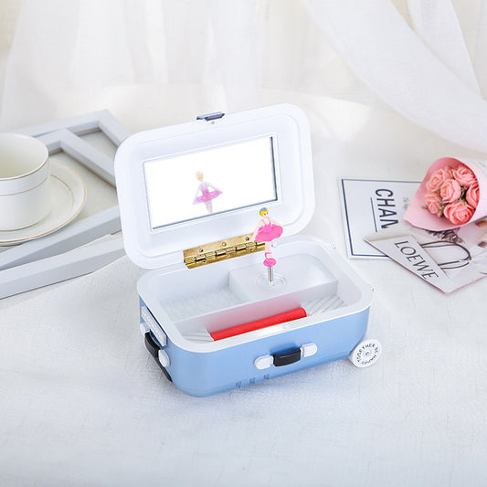 Creative cute rotating girl trolley suitcase music box