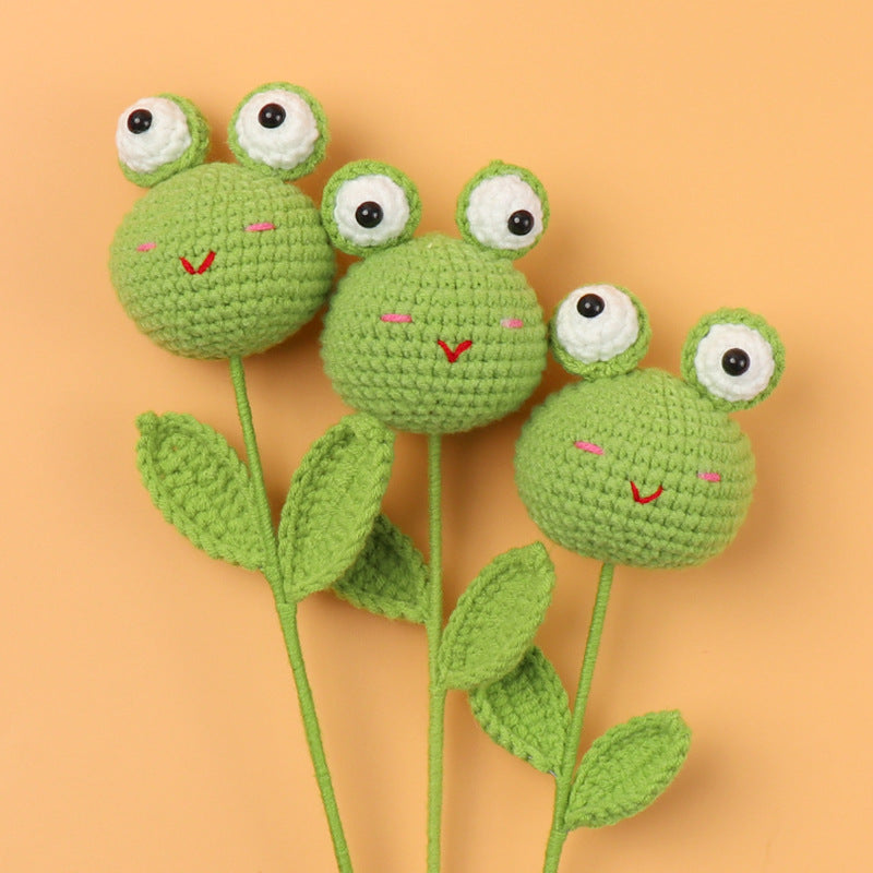 Handmade crocheted big-eyed frog doll