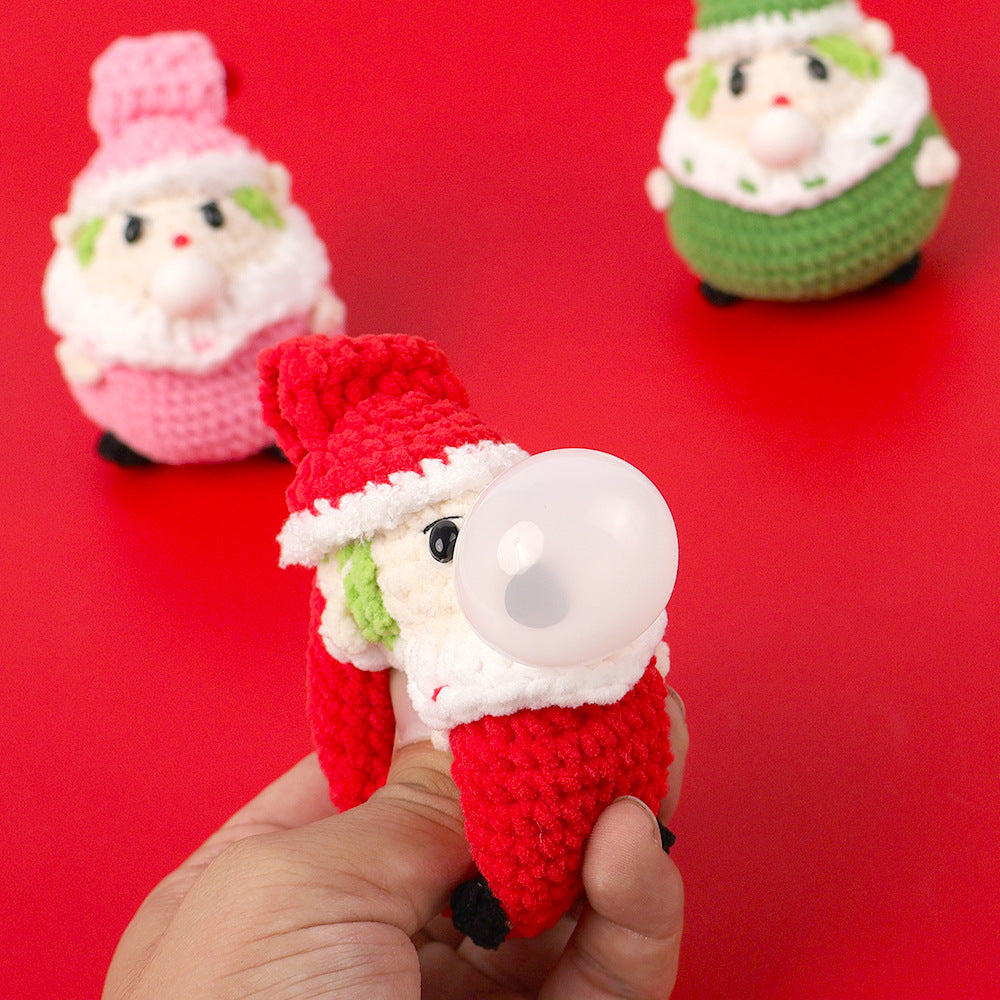 Crocheted Santa Claus blowing bubble doll