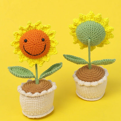 Handmade crocheted sunflower potted plant with smiling face