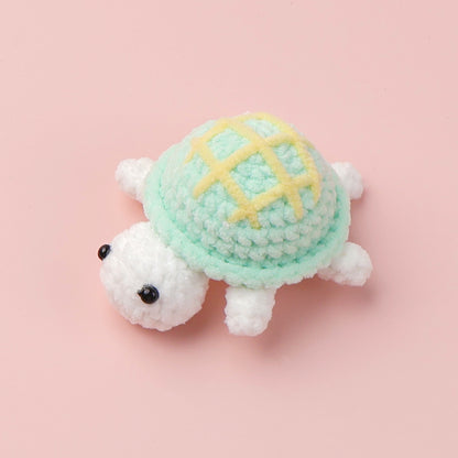 Crocheted little turtle doll