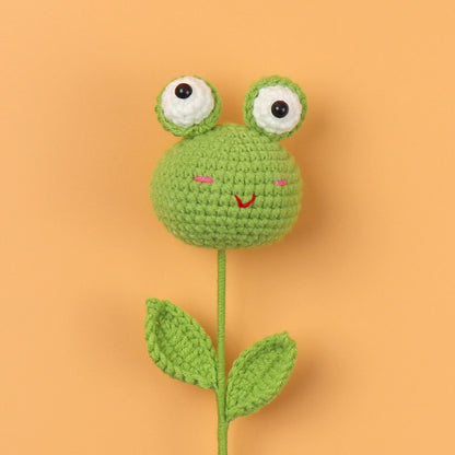 Handmade crocheted big-eyed frog doll