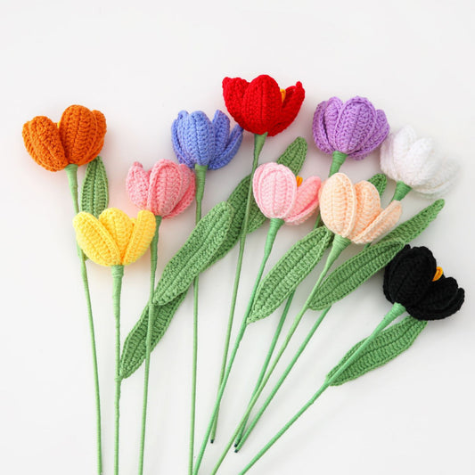 Crocheted flower blossoming tulip branch