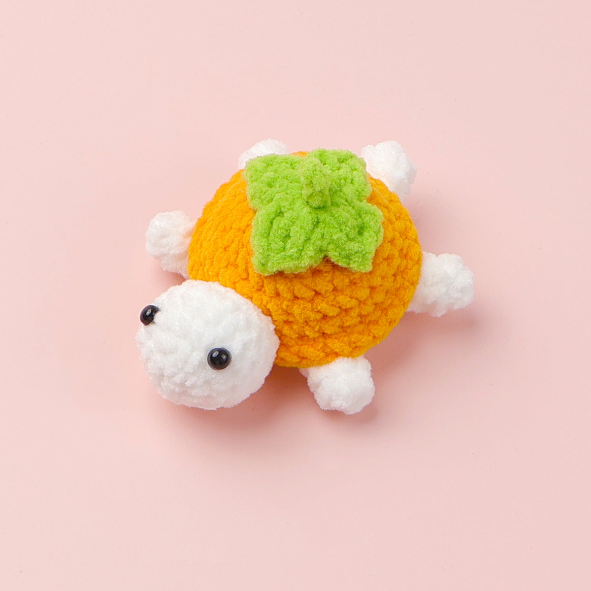 Crocheted little turtle doll